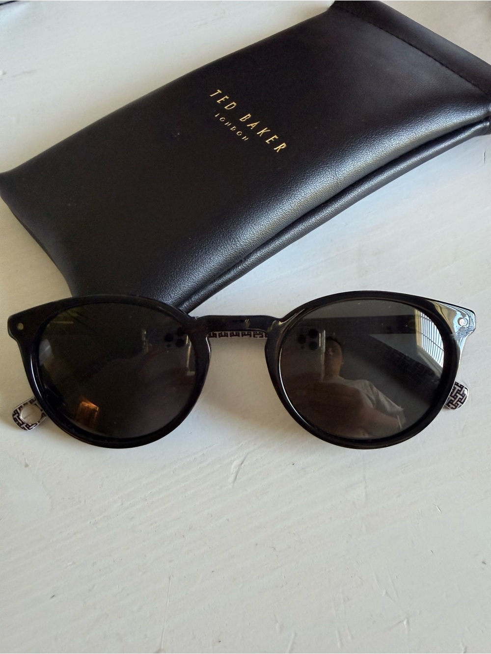 Ted Baker Black Round Sunglasses with Gold Logo Accents